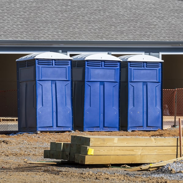 what is the cost difference between standard and deluxe portable restroom rentals in Lowland North Carolina